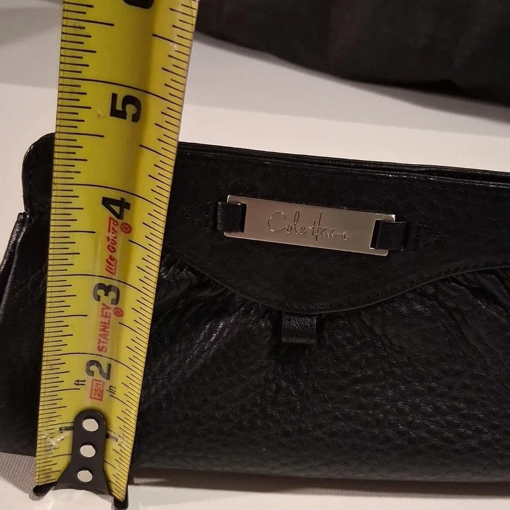 Womens Black leather clutch with textured pebbled finish great for make up